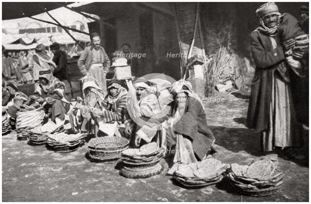 Suq El Khubur, a native bread market, Baghdad, Iraq, 1925.Artist: A Kerim