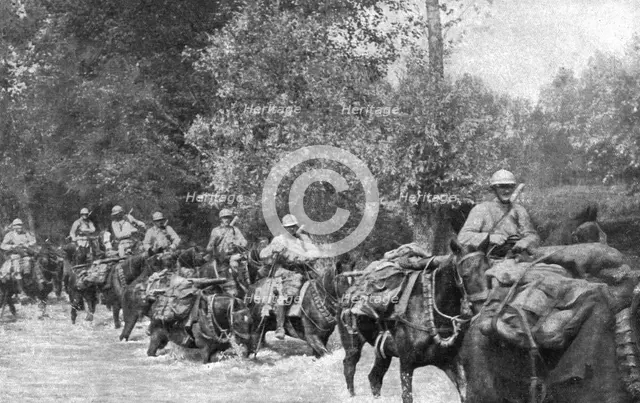 ''Sur L'Aisne; La poursuite de l'ennemi; passage d'un gue de l'Aisne par une equipe de..., 1918. Creator: Unknown.