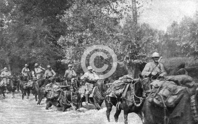 ''Sur L'Aisne; La poursuite de l'ennemi; passage d'un gue de l'Aisne par une equipe de..., 1918. Creator: Unknown.