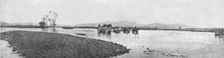 Sur la route de Monastir; une route inondee dans la plaine au Sud de Kenali 1916. Creator: Unknown