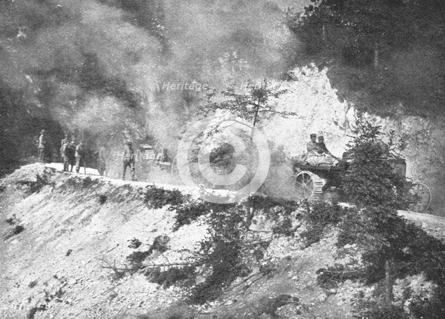 'Sur le front Italien; Dans le Haut-Isonzo, un convoi de gros canons remorques...1915 (1924). Creator: Unknown.