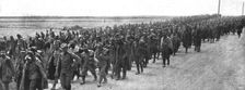 Sur le front Russe; Une des immenses caravanes de prisonniers autrichiens, 1916. Creator: Unknown