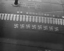 Swastika and Bomb Images Painted on the Fuselage of a Bomber Aircraft, 1943-1944. Creator: British Pathe Ltd