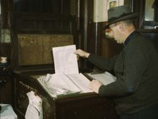 Switch lists coming in by teletype to the hump office at a C& NW RR yard, Chicago, Ill., 1942. Creator: Jack Delano