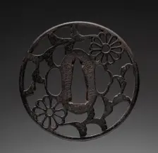 Sword Guard, late 17th century. Creator: Kuniyoshi (Japanese)