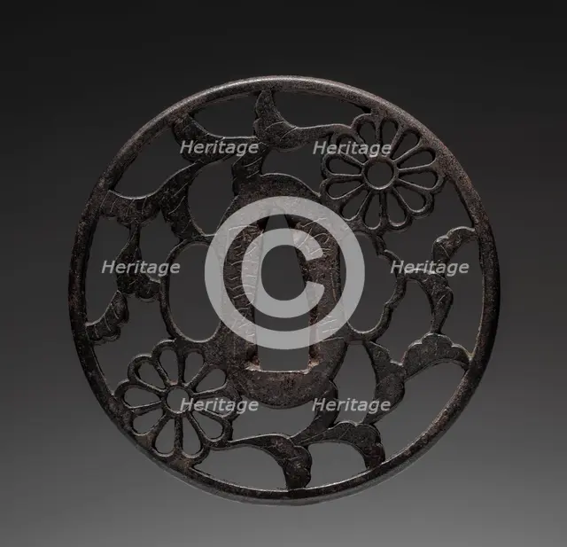 Sword Guard, late 17th century. Creator: Kuniyoshi (Japanese).