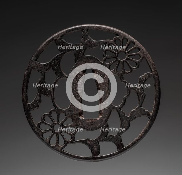 Sword Guard, late 17th century. Creator: Kuniyoshi (Japanese).