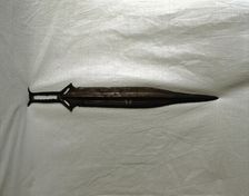 Sword of three parts barb, carp's tongue shaped blade, from Palma del Rio (Cordoba)