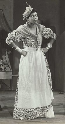 Sybil Moore portraying a typical West Indian character, 1937. Creator: Unknown