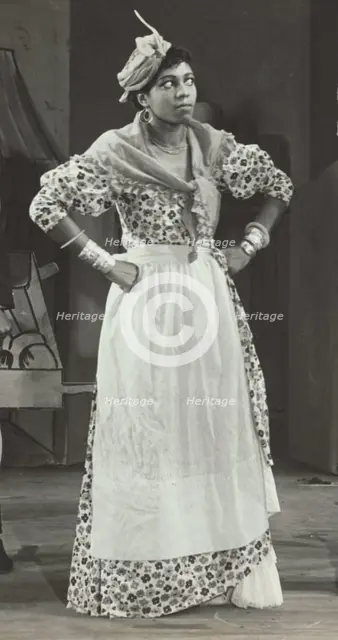 Sybil Moore portraying a typical West Indian character, 1937. Creator: Unknown.