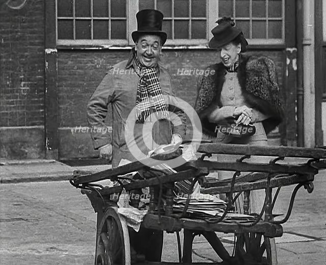 Syd Walker Talking to Nellie Wallace About Using gramophone records for War Materials, 1942. Creator: British Pathe Ltd.