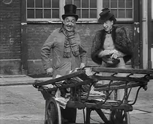 Syd Walker Talking to Nellie Wallace About Using gramophone records for War Materials, 1942. Creator: British Pathe Ltd