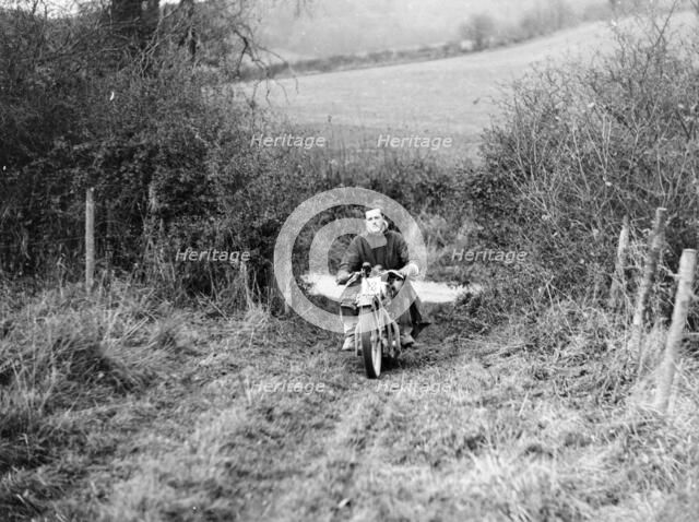 Syke riding an Ariel 4 during the Inter Varsity motor cross hill climb, November 1931. Artist: Unknown