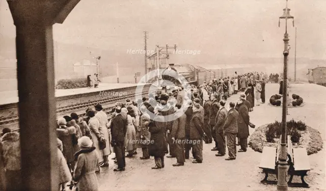 'Sympathetic interest in the Royal Funeral Train at Welwyn Station', 1936. Artist: Unknown.