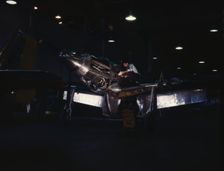 P-51 ("Mustang") fighter plane in construction, North American Aviation, Inc., LA, Calif. , (1942?). Creator: Alfred T Palmer