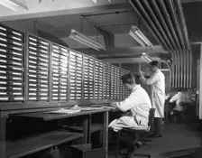 Pneumatic Tube Transport system at at Duckmanton Colliery stores near Chesterfield, 1962. Creator: Michael Walters