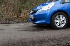 Pot holes in road surface 2017. Creator: Unknown
