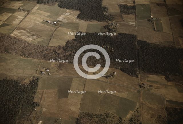 Potato farms showing layout of land and buildings, vicinity of Caribou, Aroostook, Maine., 1940. Creator: Jack Delano.