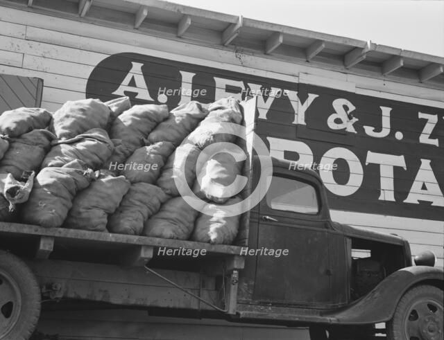 Potato shed during season, across the road..., Tulelake, Siskiyou County, California, 1939 Creator: Dorothea Lange.