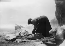 Potter building her kiln, c1906. Creator: Edward Sheriff Curtis