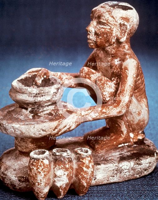 Potter turning vessels on a wheel, Ancient Egyptian, Old Kingdom, 5th Dynasty (2565-2420 BC). Artist: Unknown