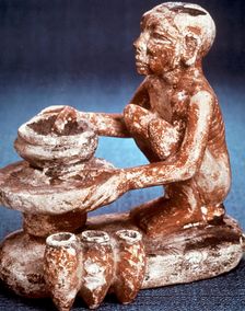 Potter turning vessels on a wheel, Ancient Egyptian, Old Kingdom, 5th Dynasty (2565-2420 BC)