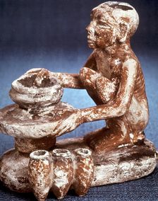 Potter turning vessels on a wheel, Ancient Egyptian, Old Kingdom, 5th Dynasty (2565-2420 BC)