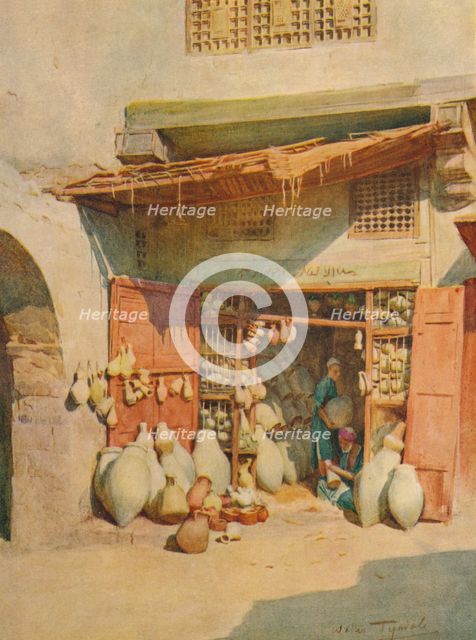 'Pottery Bazaar in a Nile Village', c1905, (1912). Artist: Walter Frederick Roofe Tyndale.