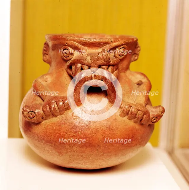 Pottery Bowl of an alligator with human arms devouring snakes, Chiriqui, Panama. Artist: Unknown.