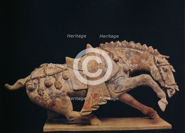 'Pottery Figure of a Horse - T'Ang Dynasty', c7th to 10th century AD, (1936). Artist: Unknown.