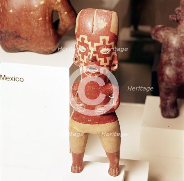 Pottery Figure of standing woman, face painted with fret pattern, Guanajuato, Mexico, 2000BC-300. Artist: Unknown.