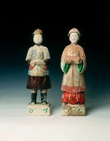 Pottery figures of a mandarin and lady, early Qing dynasty, China, 17th century. Creator: Unknown