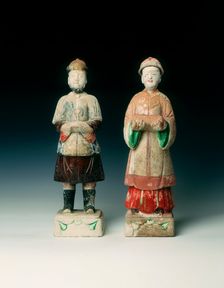 Pottery figures of a mandarin and lady, early Qing dynasty, China, 17th century