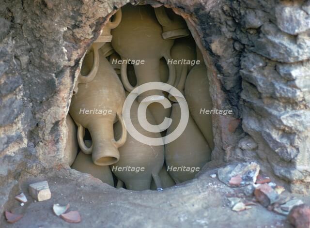 Pottery in a kiln before firing in Tunisia. Artist: Unknown
