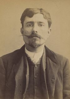 Pouget. émile, Jean, Joseph. 31 ans, né le 12/10/60 à Rodez (Aveyron). Publiciste. Anarchi..., 1892. Creator: Alphonse Bertillon