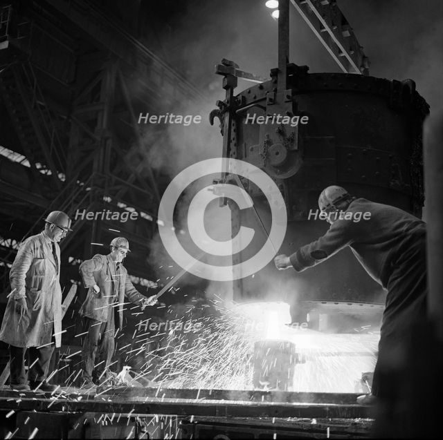 Pouring a two ton casting, Osborn Hadfields Steel Founders, Sheffield, South Yorkshire, 1968. Creator: Michael Walters.