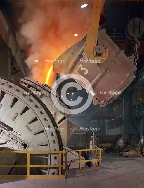 Pouring molten iron into a Kaldo unit, Park Gate Iron & Steel Co, Rotherham, South Yorkshire, 1964. Artist: Michael Walters