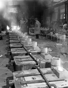Pouring small castings, Edgar Allen Steel Co, Sheffield, South Yorkshire, 1963. Creator: Michael Walters