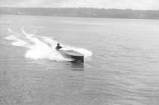Power boat under way, 1914. Creator: Kirk & Sons of Cowes