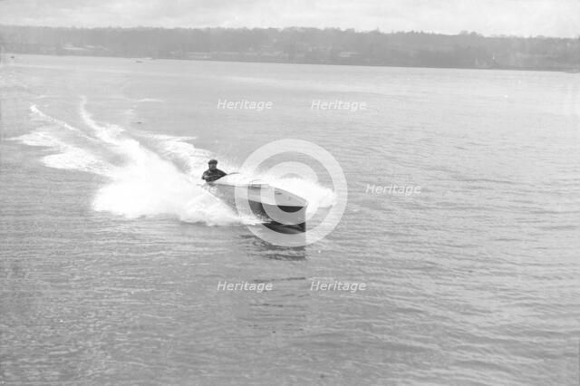 Power boat under way, 1914. Creator: Kirk & Sons of Cowes.