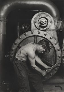 Power house mechanic working on steam pump, 1920. Creator: Lewis Wickes Hine