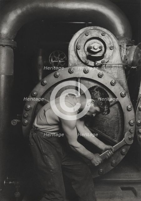Power house mechanic working on steam pump, 1920. Creator: Lewis Wickes Hine.