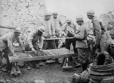 Poilus making mattresses, between c1915 and c1918. Creator: Bain News Service