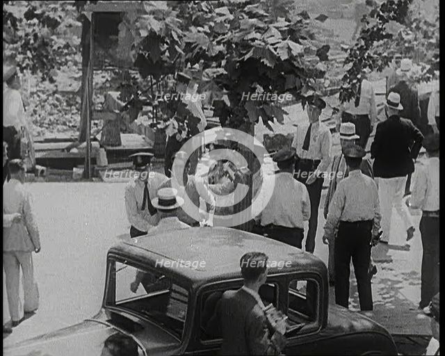 Police Officers Confronting Protesting Soldiers  To Disperse the Army Veterans, 1932. Creator: British Pathe Ltd.