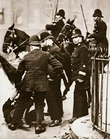 Police arresting a group of hunger marchers in London, 1932. Creator: Unknown