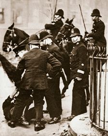Police arresting a group of hunger marchers in London, 1932. Creator: Unknown