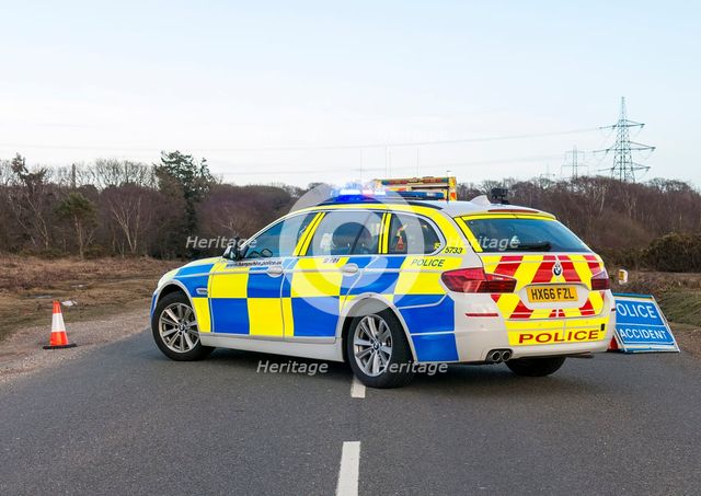 Police car and ambulance attending road traffic accident 2018. Creator: Unknown.