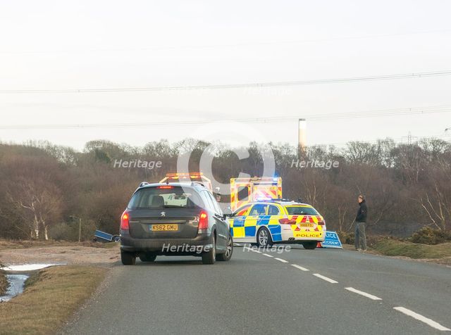 Police car and ambulance attending road traffic accident 2018. Creator: Unknown.