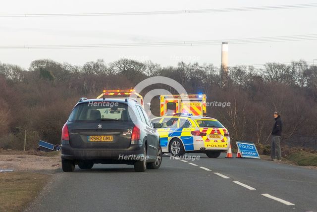 Police car and ambulance attending road traffic accident 2018. Creator: Unknown.