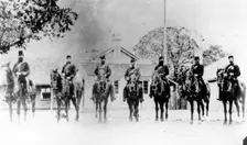 Police Commissioner and troopers outside Brisbane Police Headquarters 1868. Creator: Unknown